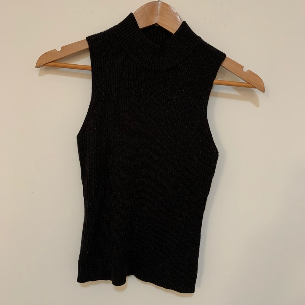 Sleeveless black turtleneck sweater